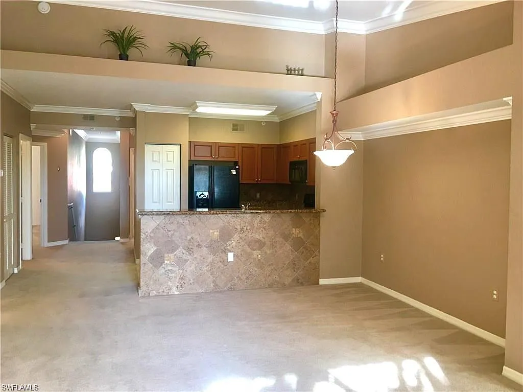 Building Photo - 10101 Villagio Palms Way #206
