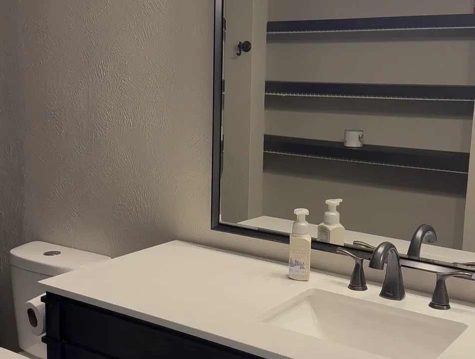 Newly remodeled bathroom with large vanity.
