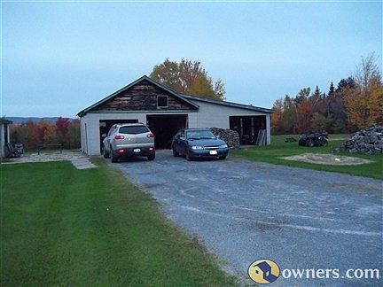 Two car garage with a third for storage