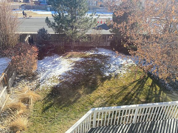 Beautiful fenced backyard with trex deck.