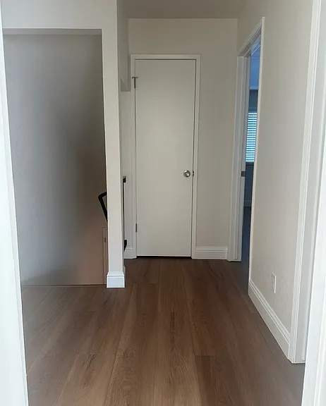 Looking from master bedroom towards a second linen closet and bedroom
