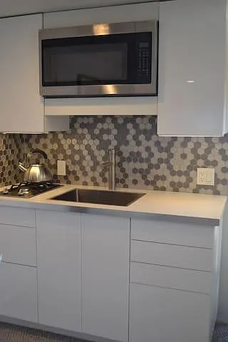 Kitchenette
Full size refrigerator on the other side