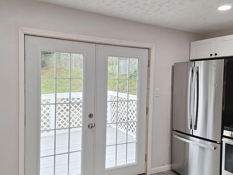 French doors to the deck and patio