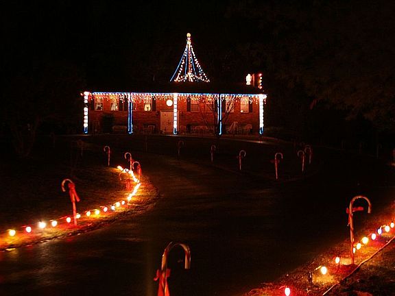View of house from street at Christmas time
