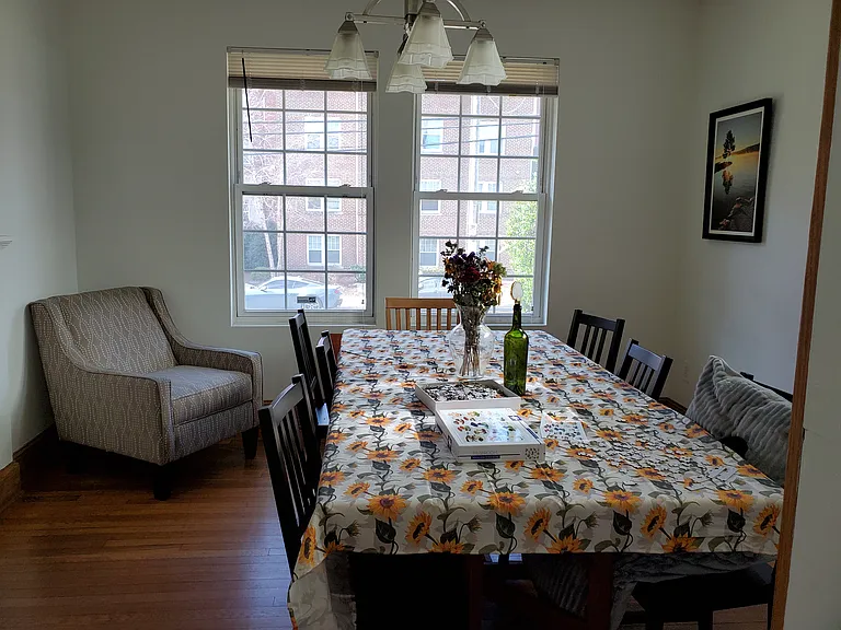 Furnished dining room. Housemates may move furniture around and add their own home decor.
