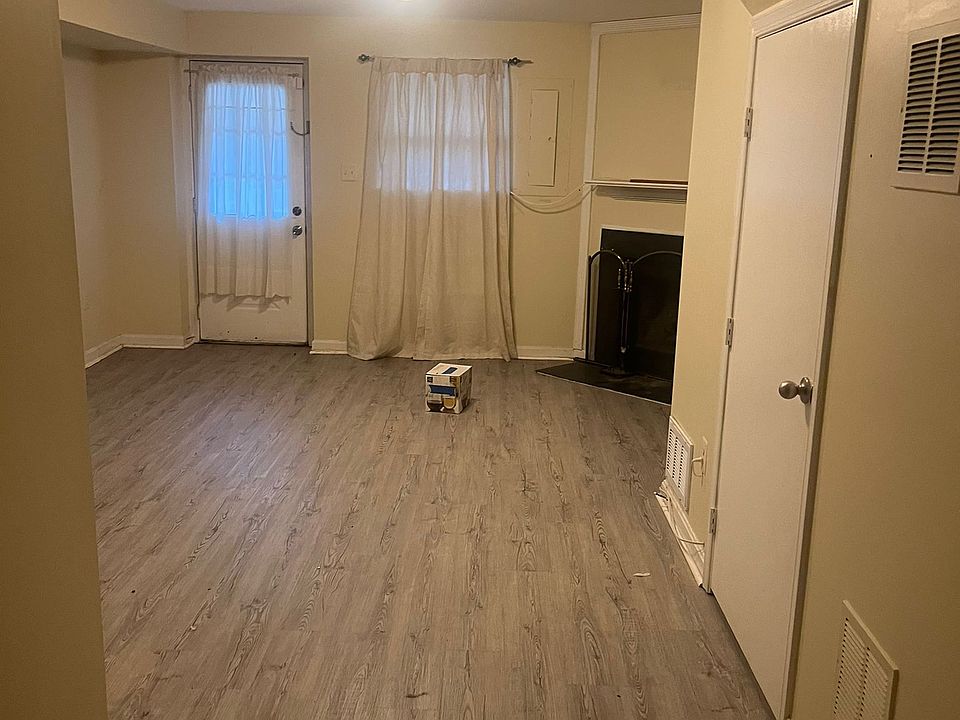 Basement and laundry room with under the stair storage. There is a full bathroom as well