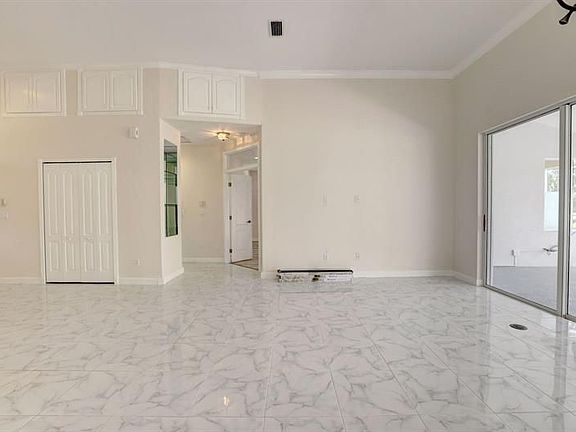 5th image of 8028 Plantation Lakes Dr