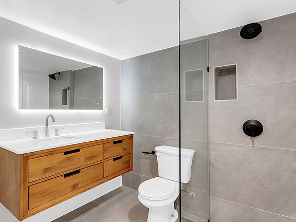 bathroom with walk in shower