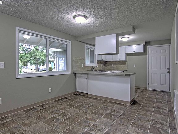 5th image of 4116 NE Burtonwood Ct