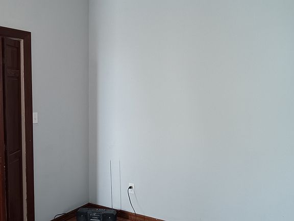 Second room off living room. Could be either third bed room or small office. Room has closet and window for tons of natural light.