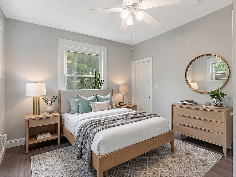Back bedroom with walk-in closet staged