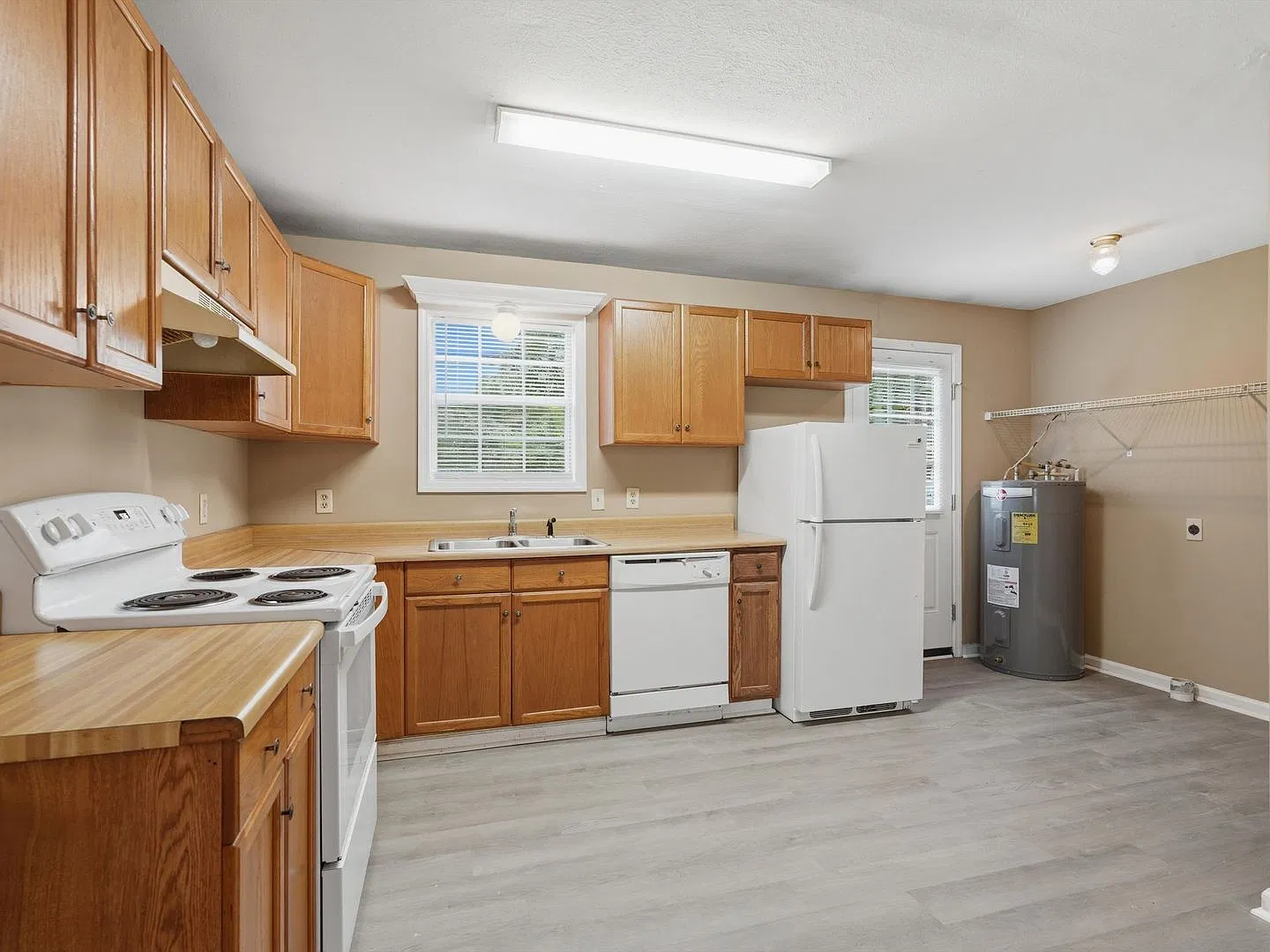Duplex in East Limestone! Fresh paint and new LVP flooring! — Photo 4