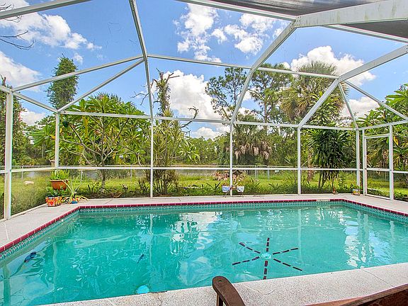 Large pool overlooking lake