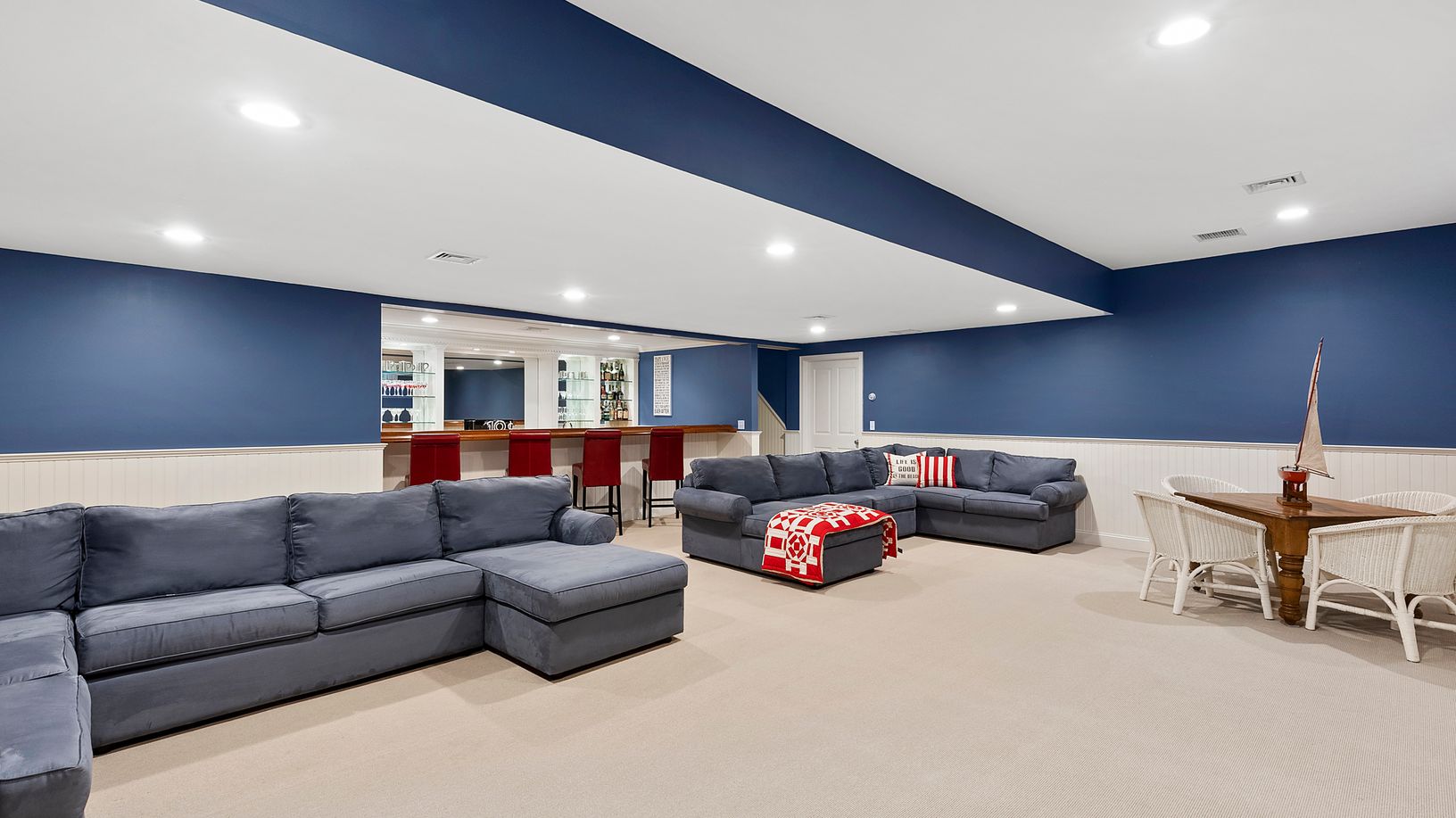 Finished lower level with bar, office, media room, storage