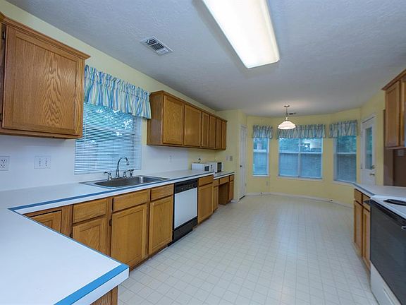 Kitchen with lots of counter space and cabinets.