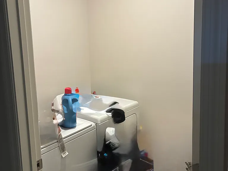 Designated laundry room. Washer dryer included.