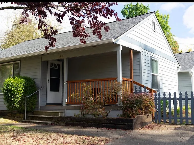 Exterior, 1 reserved parking spot with side yard