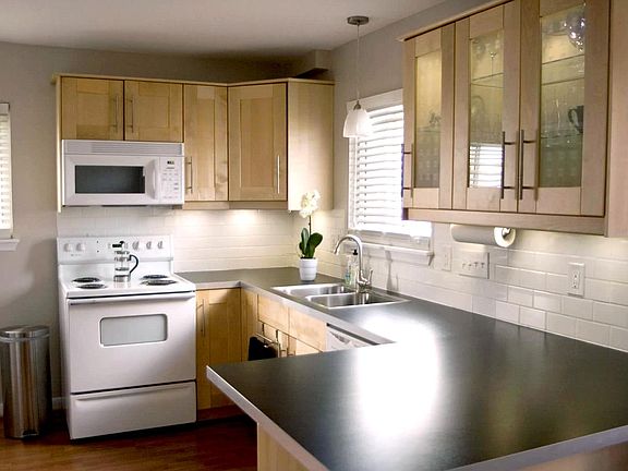 Updated Kitchen with Cabinet Lighting.