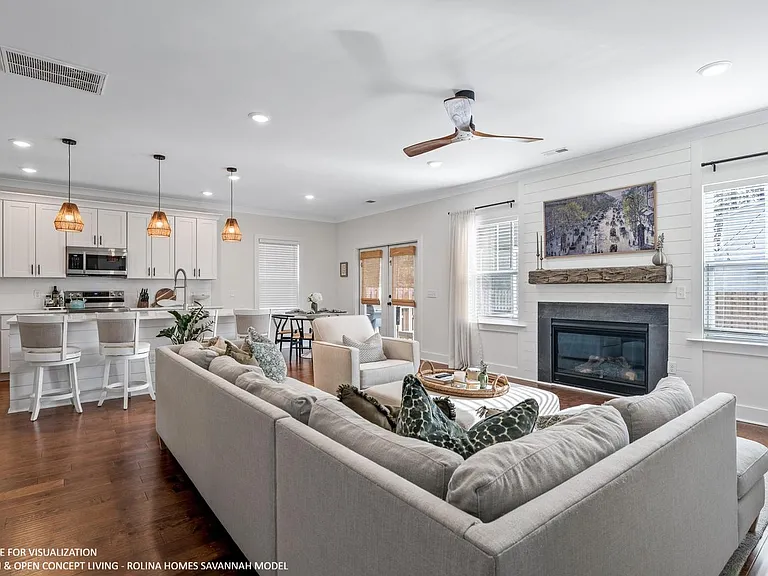 LIVING ROOM PICTURE FROM A DIFFERENT SAVANNAH MODEL RECENTLY BUILT BY ROLINA HOMES