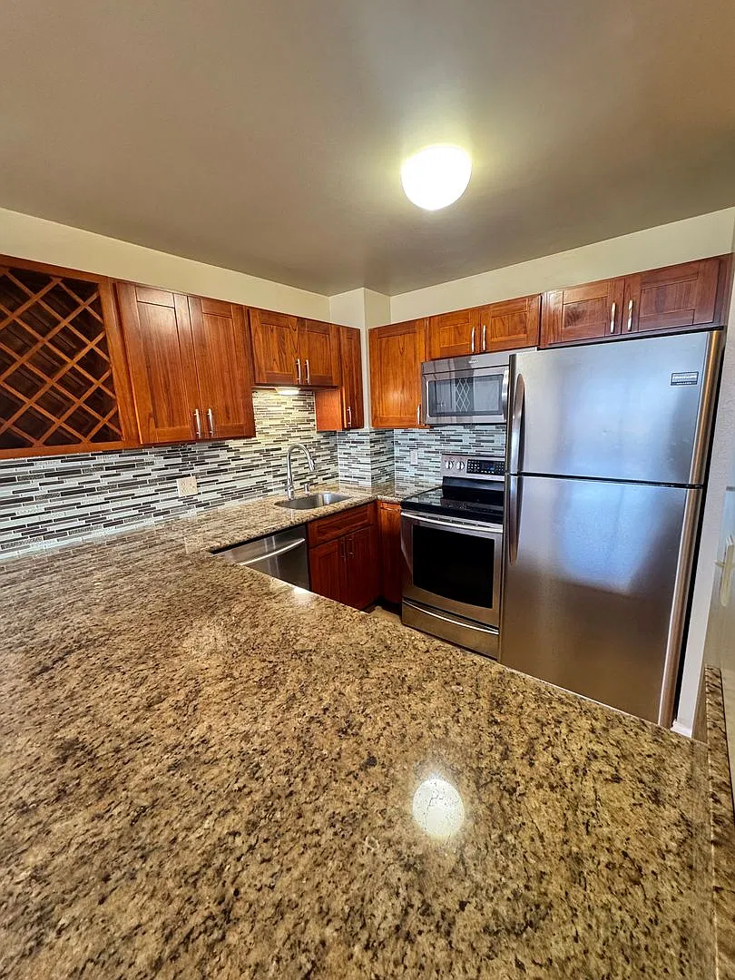 Updated 1 bed, 1 bath, 1 parking unit in Kukui Plaza Towers! — Photo 3
