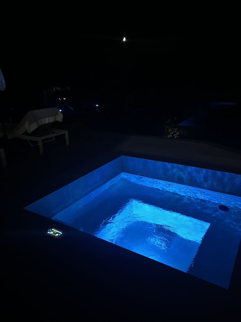 Pool Deck Jacuzzi at Night