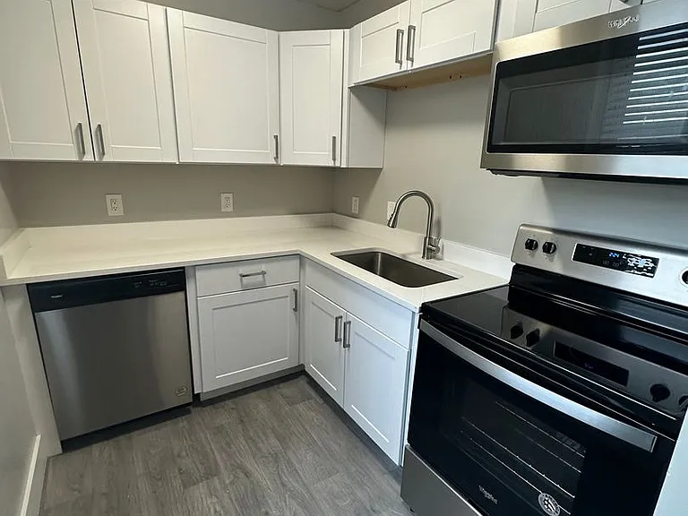 New Brigham Apartments — Photo 26