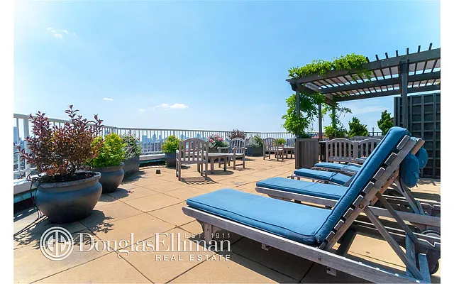 Sold by Douglas Elliman | media 18