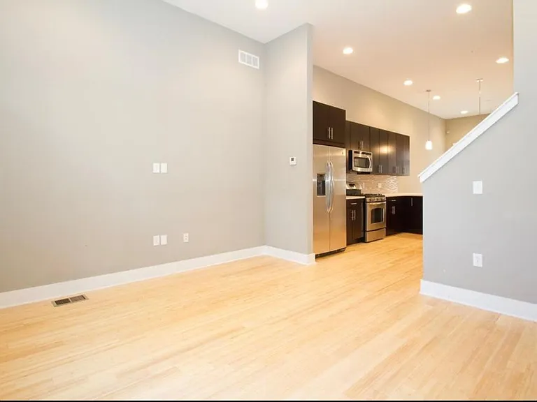 View of living room and kitchen