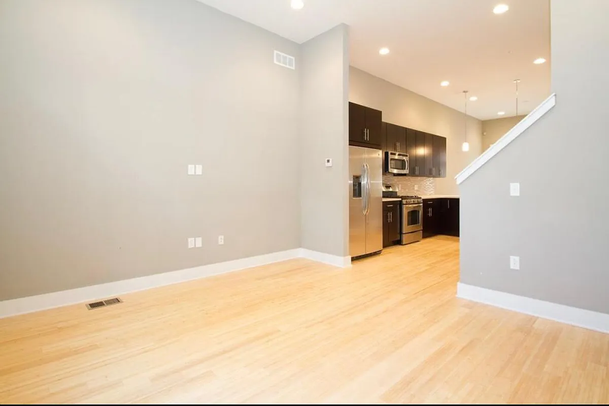 View of living room and kitchen - 919 N 5th St