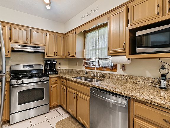 This beautiful kitchen boasts all new appliances, updated cabinets, granite counter tops.  There is 