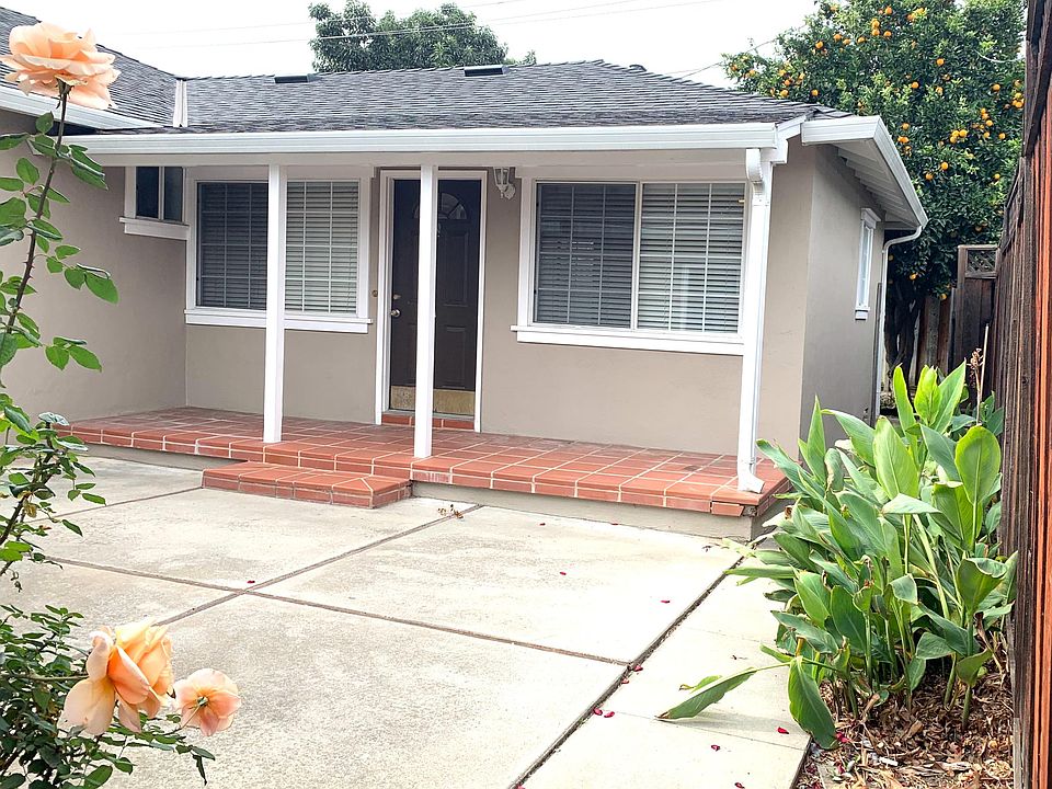 front door. Unit behind garage from driveway and street. Total Privacy!
