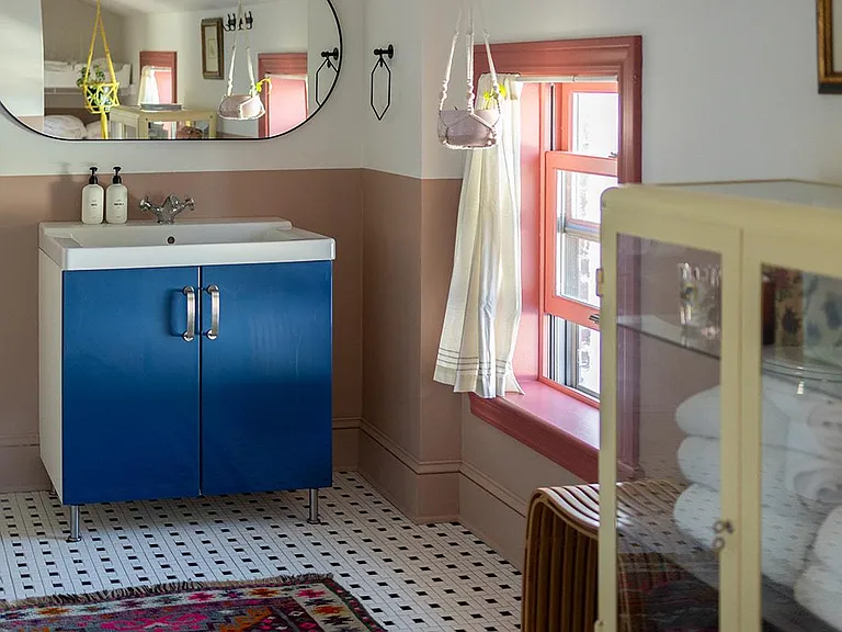 Step into the cutest bathroom in the house! ______ With a peaceful and sweet design, this space has everything you need for your stay with us.