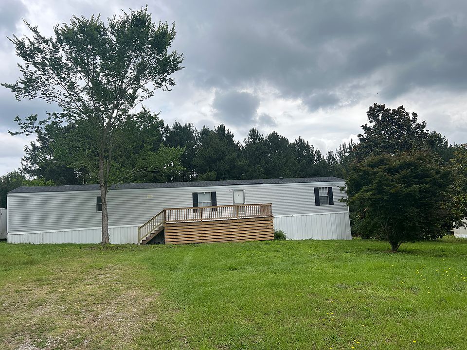 Large front yard set off from the road