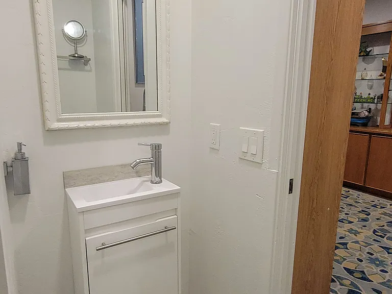 Sink in private ensuite bathroom.