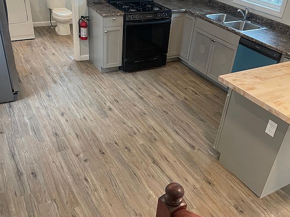 Kitchen with Stove, Refrigerator, Dishwasher, Microwave
