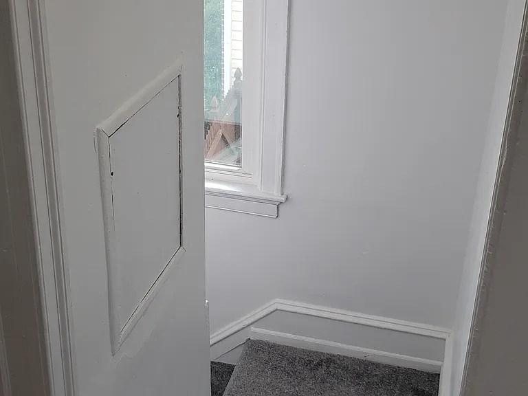 Down stairwell to front door