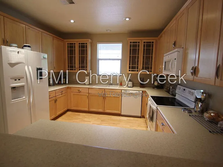 6385 S Xanadu Way — Photo 4