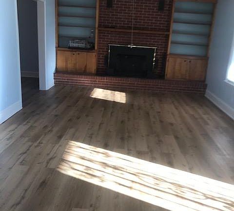 Fireplace insert provides added heat via convection.