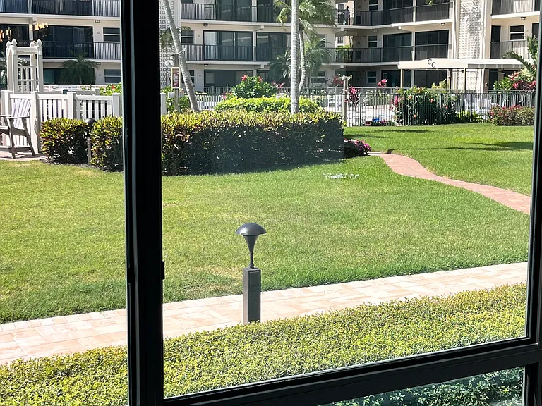 court yard with heated saltwater pool and grill area