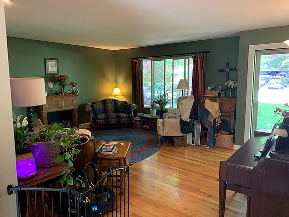 Front living room. Fireplace is a portable unit that belongs to the current tenant (they will take it with them).