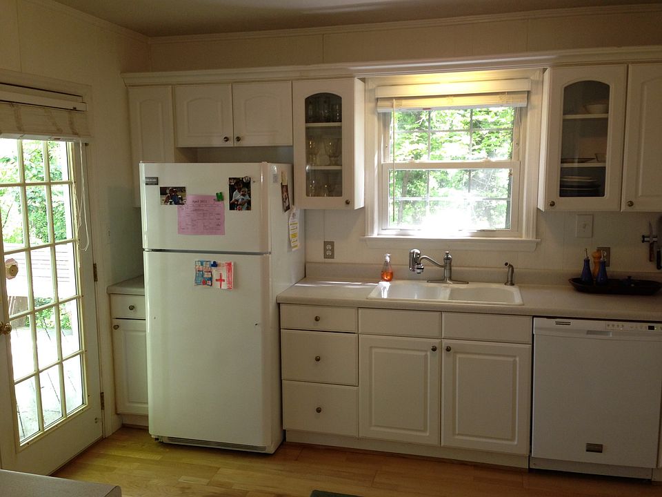 Kitchen with access to deck and washer dryer