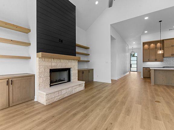 Gas fireplace with stone mantle