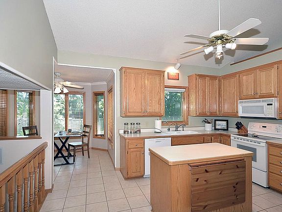 kitchen open to TV & eating 