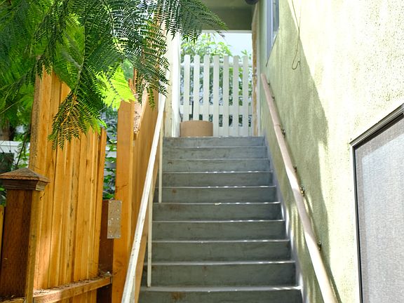 Steps up to apartment, will be painted next week and bike removed :)