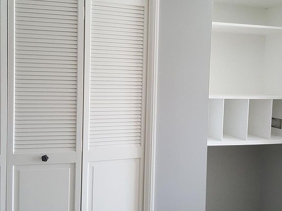 Hall closet and shelving