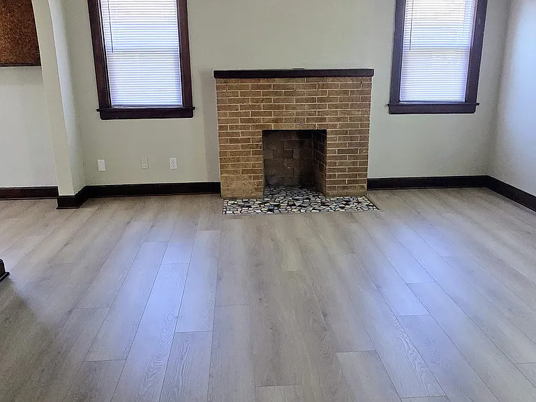 Living room with decorative fireplace