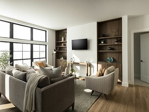 Experience the charm of this elegantly designed living room, perfect for relaxation and entertainment.