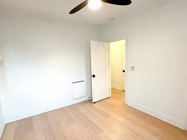 Bedroom with wall heater