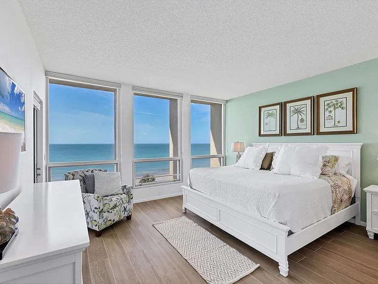 Wake up to gorgeous light-drenched Primary Suite direct gulf view and walk out to balcony from your bedroom.