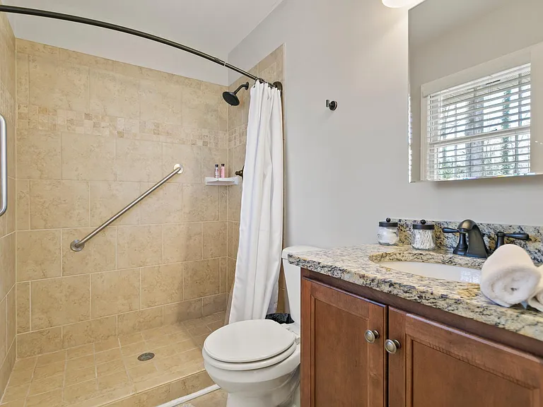 Master walk in shower on main floor